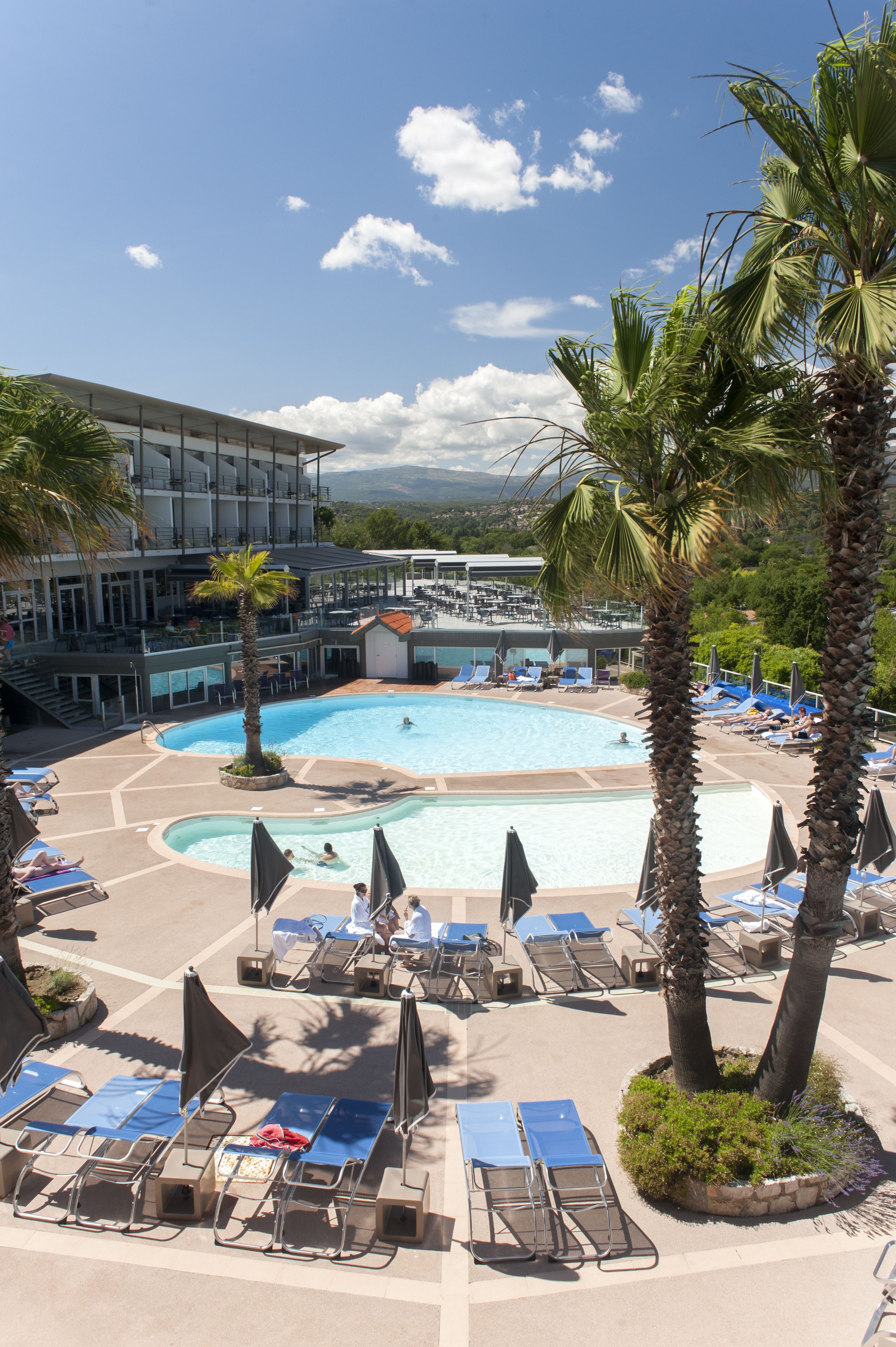 indoor pool, seasonal outdoor pool, pool umbrellas, pool loungers