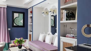 Junior Suite, Garden View | Living area | 50-inch LCD TV with satellite channels, TV