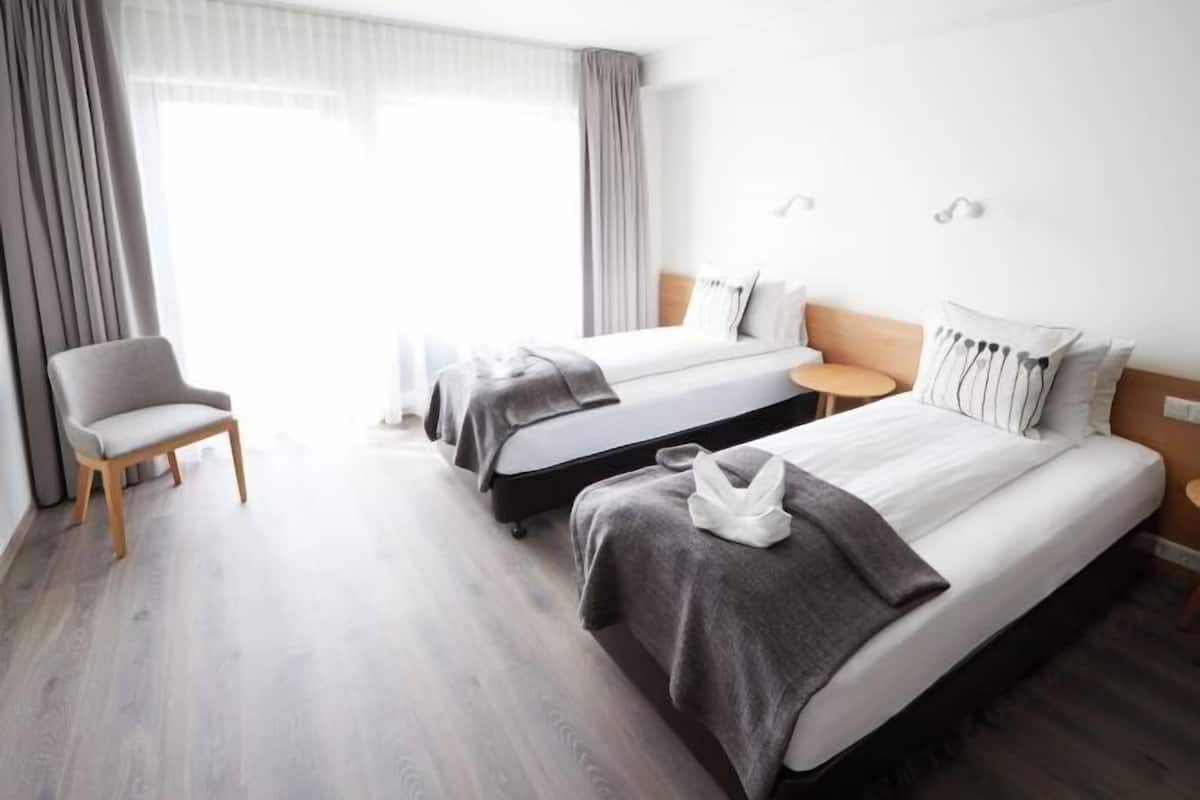 In-room safe, desk, free cribs/infant beds, bed sheets