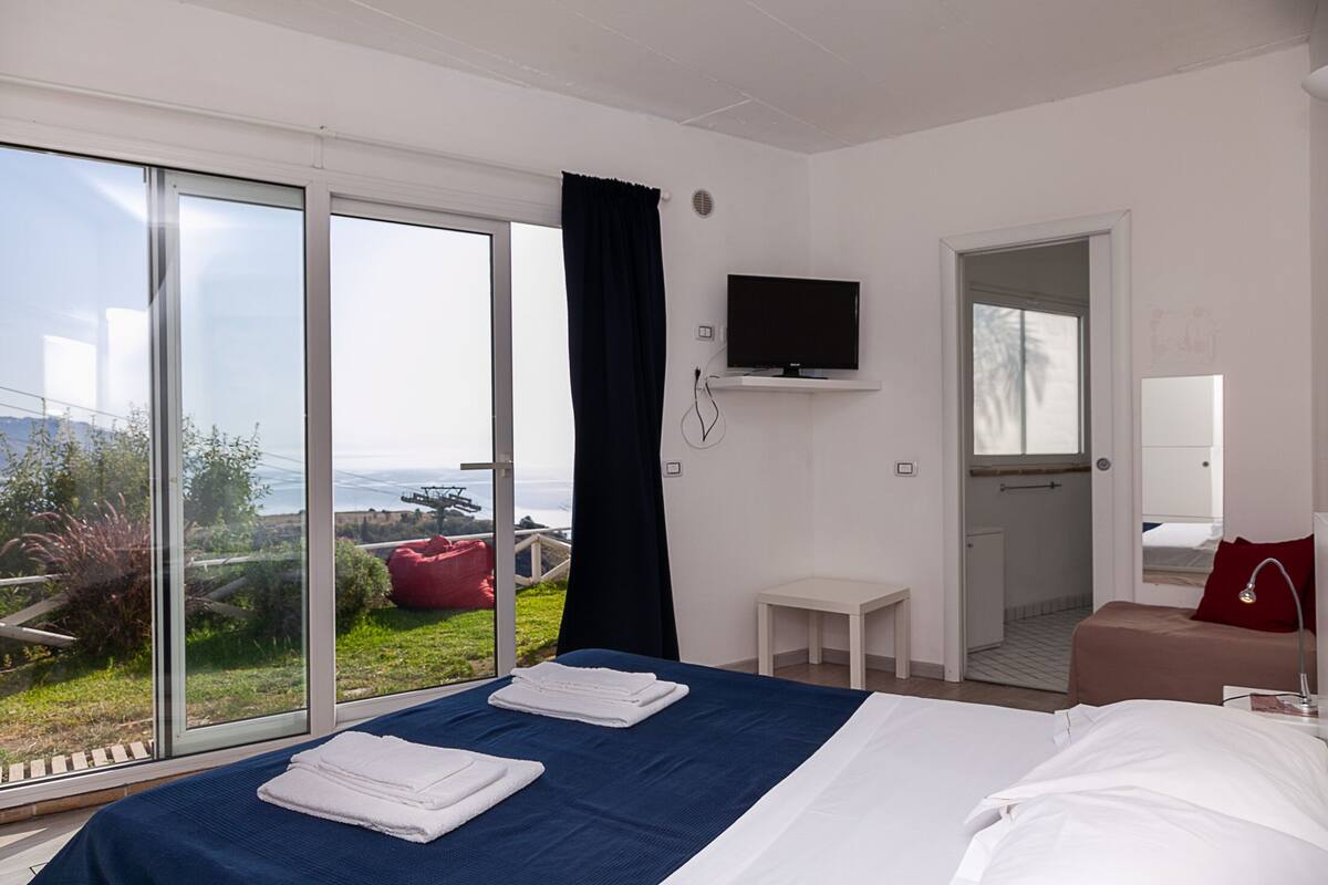 In-room safe, blackout curtains, iron/ironing board, travel cot