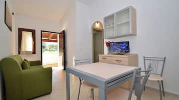 Family Apartment, 2 Bedrooms, Private Pool (Località Piricone) | Living area | LCD TV