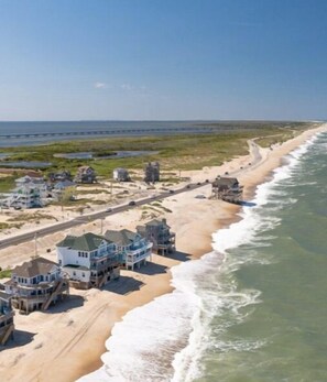 On the beach, beach towels - 6 Bed Oceanfront Home in OBX w/ Hot Tub! (Rodanthe)