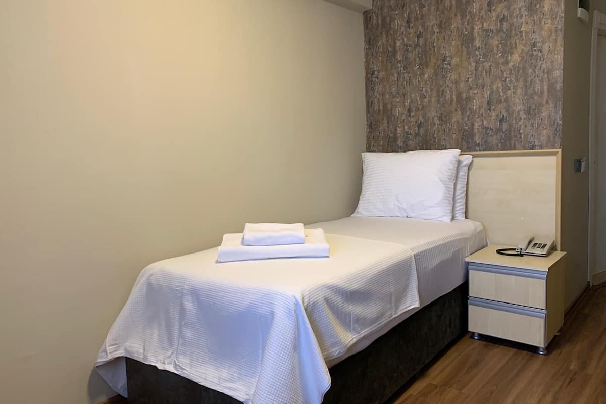 Kamar Single Standar | Seprai katun Mesir, seprai premium, selimut bulu angsa, dan Wi-Fi gratis