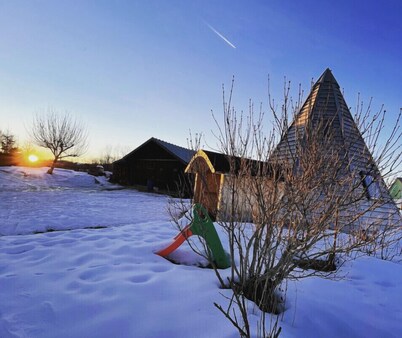 Quiet, comfortable wooden tepee in a small Jura village near our horses.