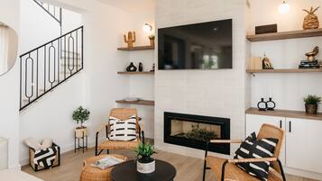 Smart TV, fireplace, books