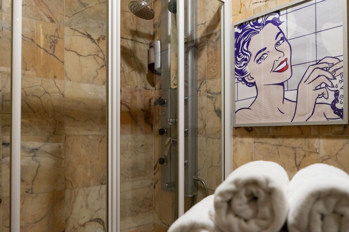 Bathtub, hair dryer, towels