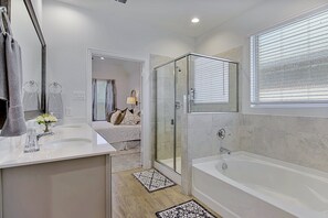 Combined shower/bathtub, towels, soap, shampoo