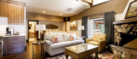 Suite, 1 Bedroom | Living room | Fireplace