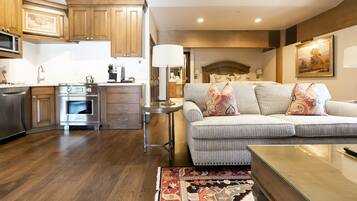 Suite, 1 Bedroom | Living room | Fireplace