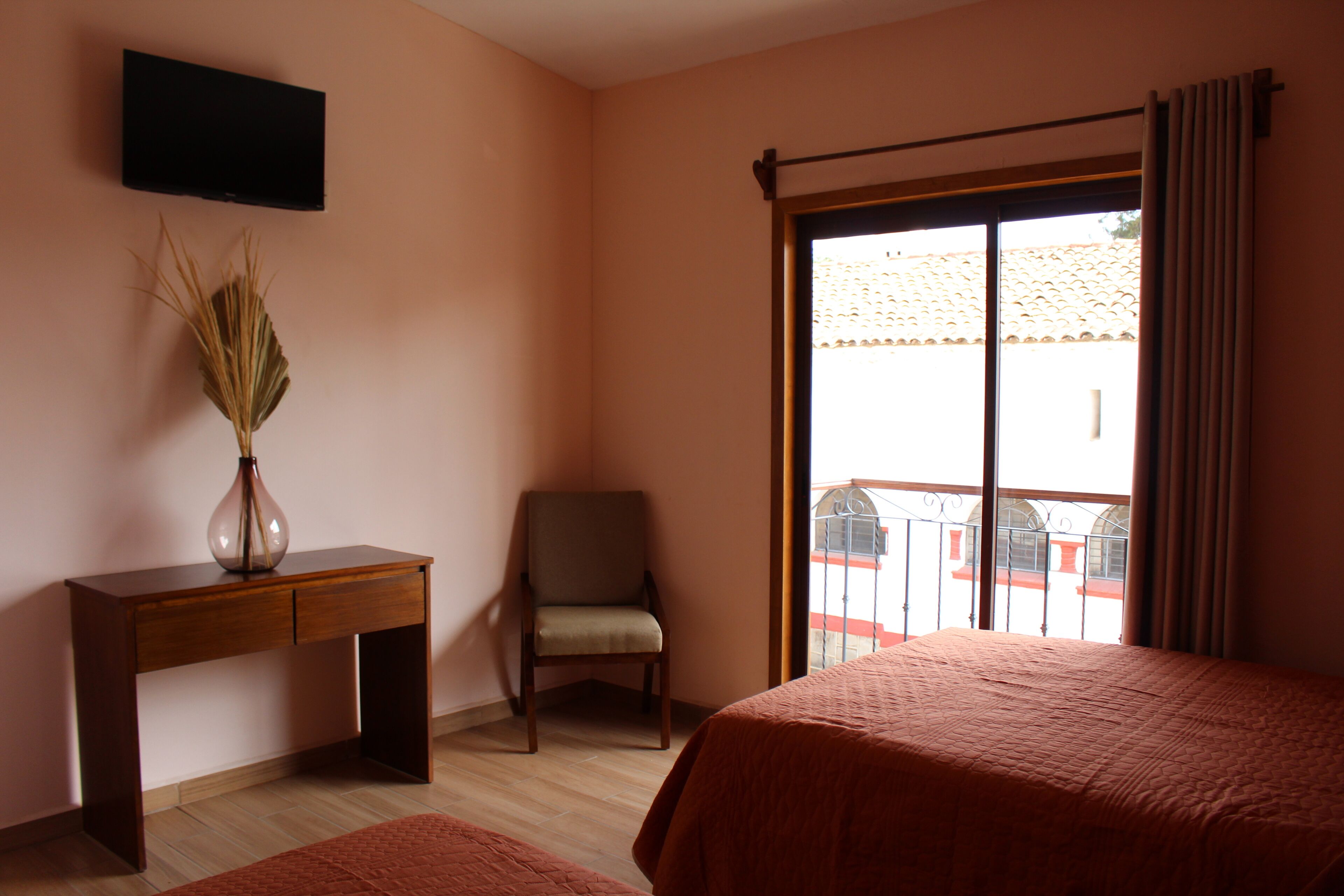 family room, 2 double beds, city view | down duvets, desk, free wifi