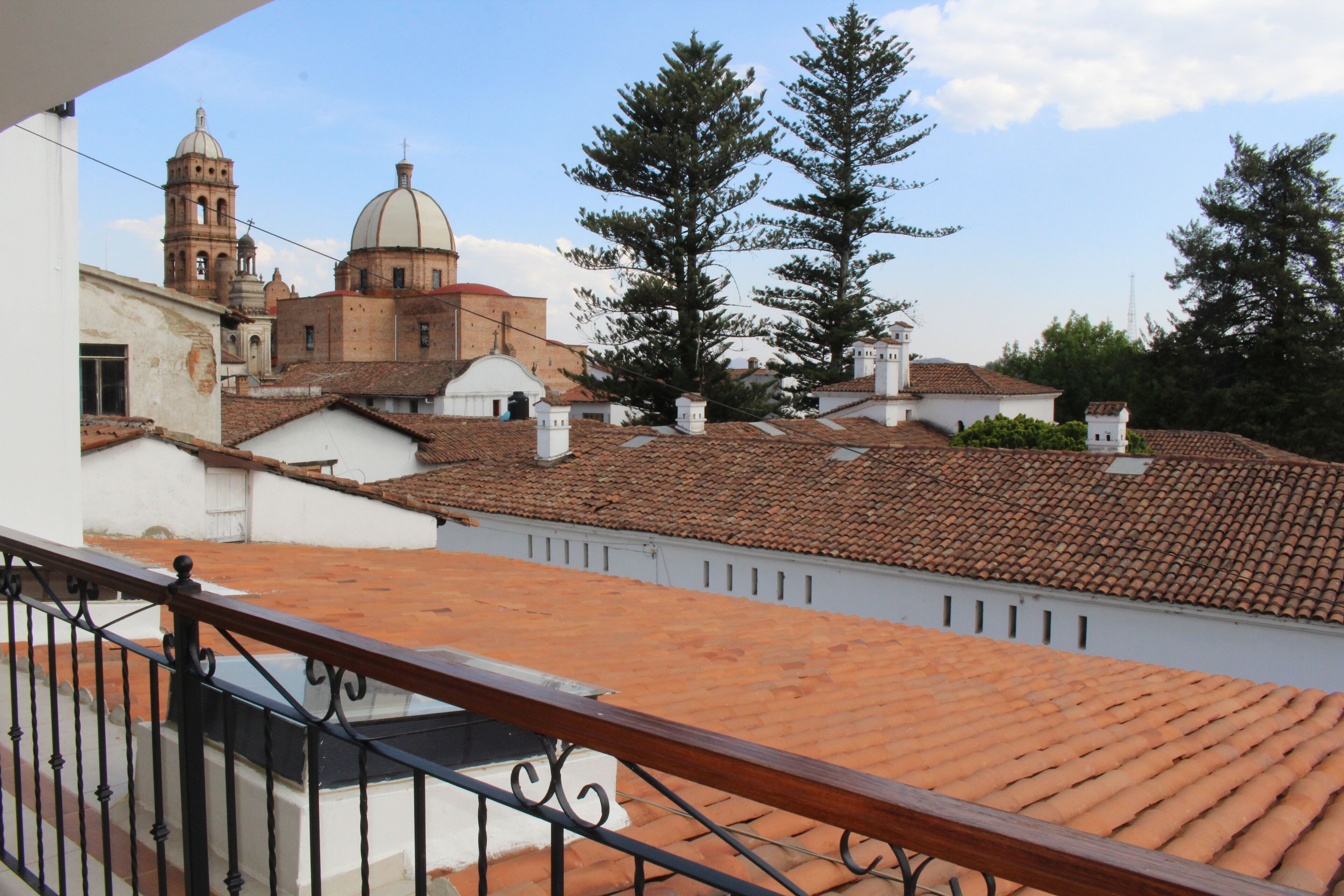 family room, 2 double beds, city view | down duvets, desk, free wifi