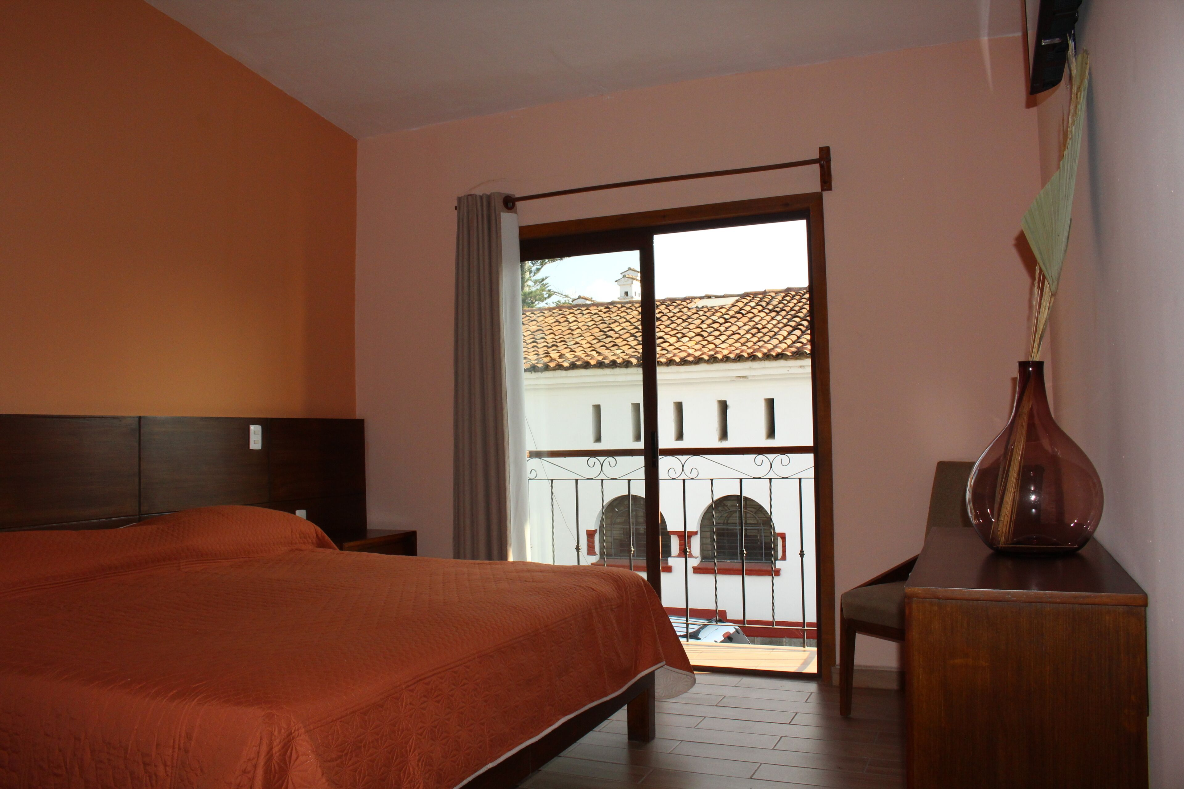 comfort room, 1 king bed, city view | down duvets, desk, free wifi