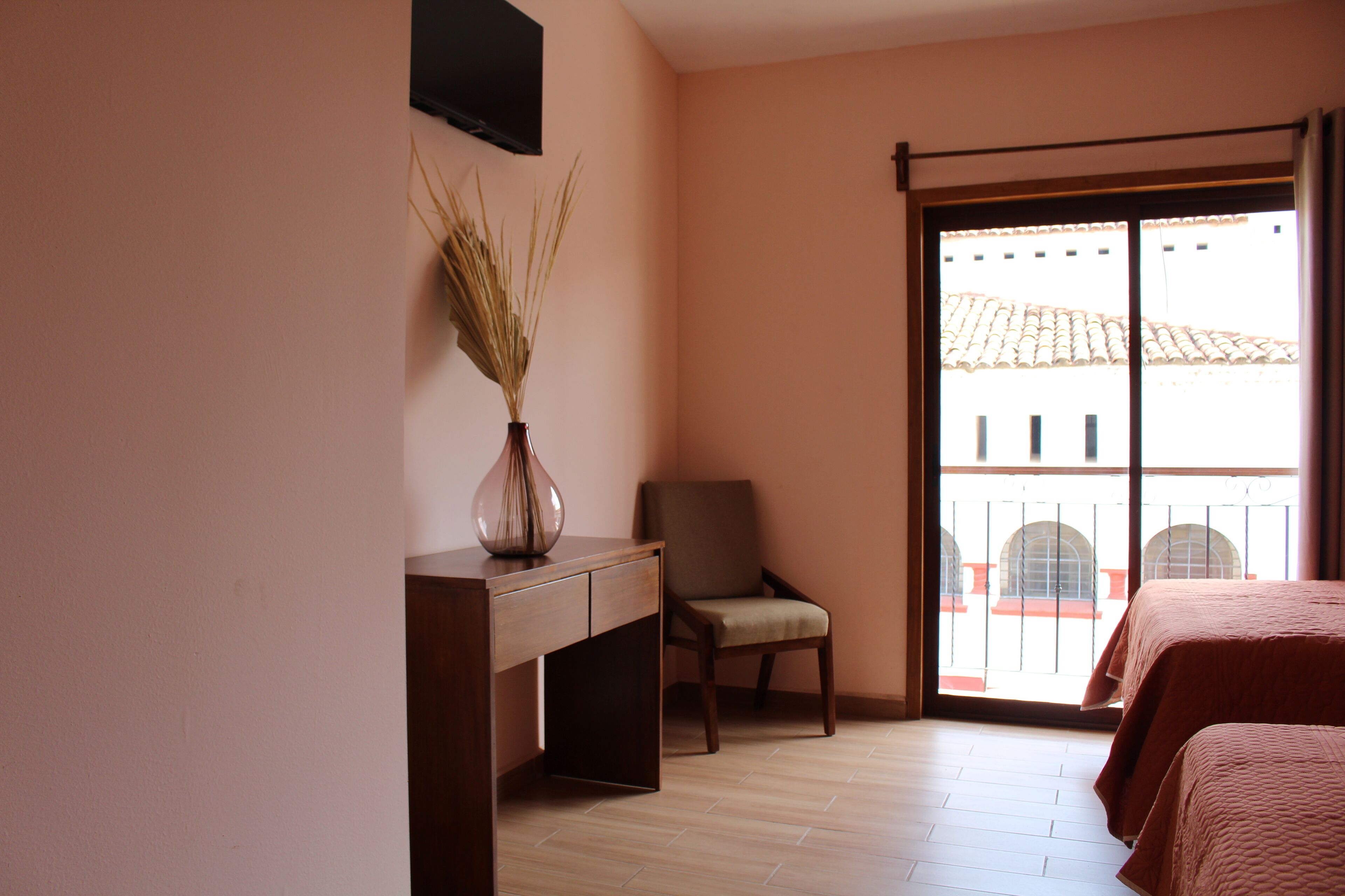 family room, 2 double beds, city view | down duvets, desk, free wifi