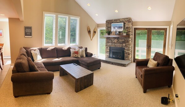 Smart TV, fireplace, books
