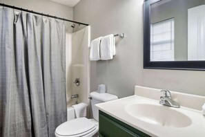 Bathtub, hair dryer, towels