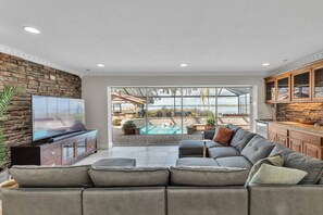 TV, table football, offices - Luxury Lakefront Retreat | Heated Pool, Theater & Private Dock | Near Legoland | EV Charger (Winter Haven)