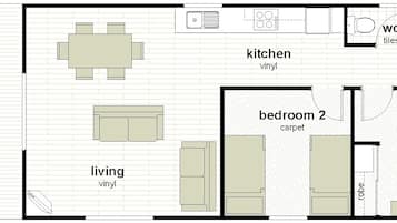 Plano de planta que muestra una sala de estar, comedor, cocina, dos dormitorios y un baño.