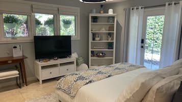 1 bedroom, desk, iron/ironing board, travel crib