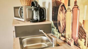 Fridge, microwave, coffee/tea maker, electric kettle