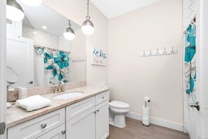 Bathtub, hair dryer, towels