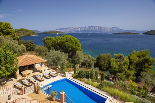 Private waterfront villa with pool and two private beaches