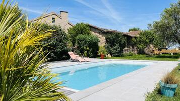 Seasonal outdoor pool, open 10:00 AM to 9:30 PM, sun loungers