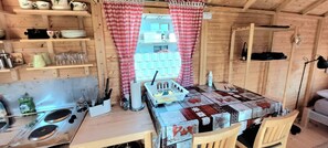 Fridge, stovetop, coffee/tea maker, electric kettle
