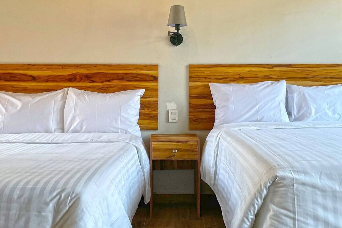 Desk, laptop workspace, free WiFi, bed sheets