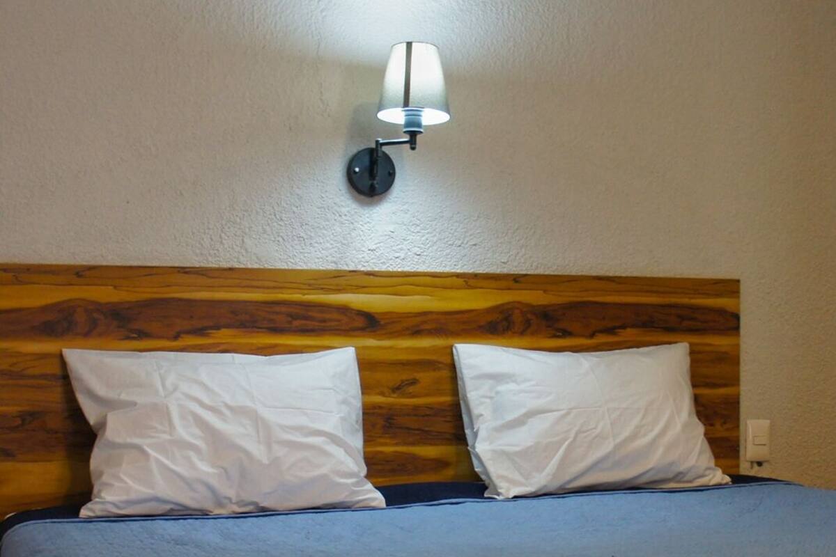 Desk, laptop workspace, free WiFi, bed sheets