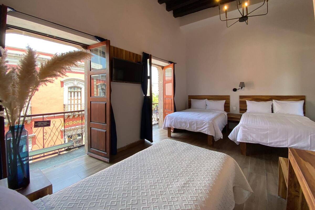 Desk, laptop workspace, free WiFi, bed sheets