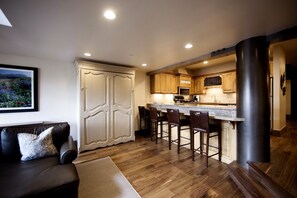 Enjoy meals in the spacious kitchen and dining area with a bar and island.