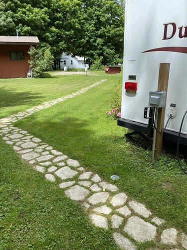 Beautiful Camper on a country road.