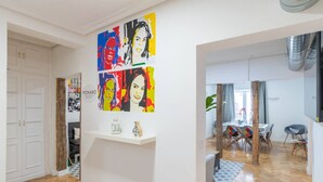 A modern interior with a dining area, white walls, and a herringbone floor pattern. - ART-POP groups, by MONARO***** (Madrid)