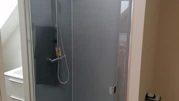 Combined shower/tub, hair dryer, towels, toilet paper