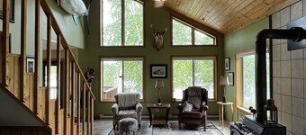 Lake cabin on 5 acres and 780' of shoreline on an island with panoramic views.