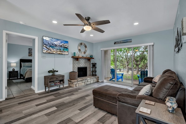 Smart TV, fireplace, books