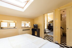 Bedroom with double bed, skylight window, ensuite bathroom, large wardrobe