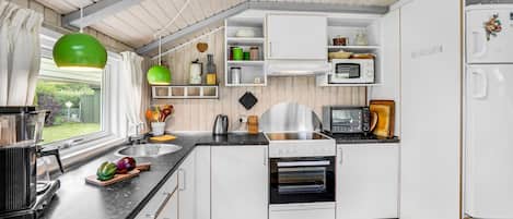 Fridge, stovetop, coffee/tea maker