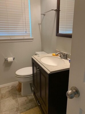 Combined shower/tub, towels, soap, toilet paper
