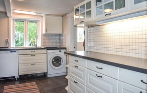 Fridge, stovetop, dishwasher, coffee/tea maker