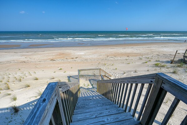 On the beach, sun-loungers, beach towels