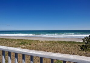 On the beach, sun-loungers, beach towels