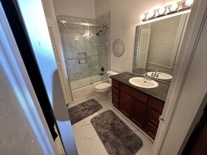 Combined shower/tub