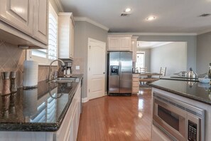 Fridge, microwave, oven, stovetop - Tuscany - Lake Travis Lakefront - Private Dock (Point Venture)