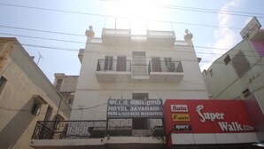 A hotel with balconies and a sign for 'Hotel Javaram'. - Hotel Jayaram (Chidambaram)