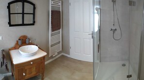 Shower, towels, soap, toilet paper