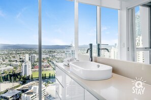 Bathtub, hair dryer, towels, soap