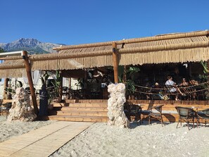 Apartment, 2 Bedrooms, Balcony, Mountain View | Outdoor dining - Olea Residence, Luxury sea View Apartment With Private Beach (Himarë)