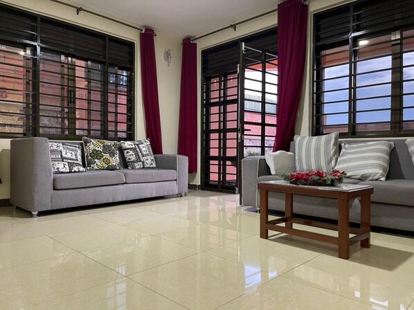 Apartment, 4 Bedrooms, Balcony, City View | Living room