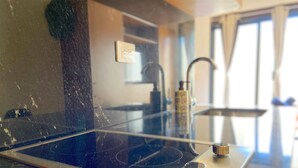 Private kitchen - Charming and Bright Studio (Tulum)